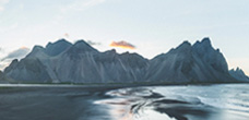 Iceland landscape photo, mountains and beach.